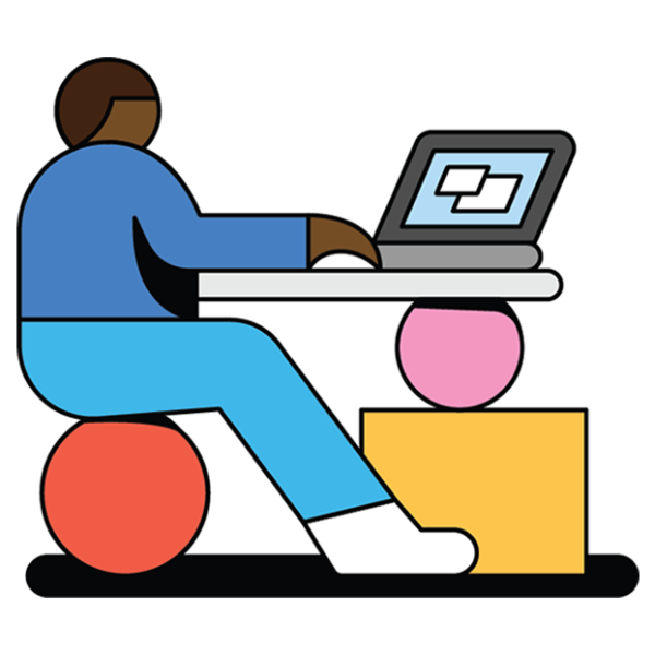 A person sitting on a ball working on a computer