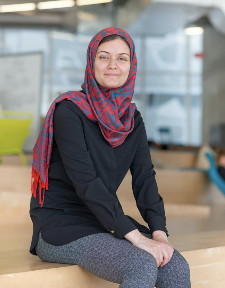 Sara Asalya sits in the Student Learning Centre wearing a head scarf