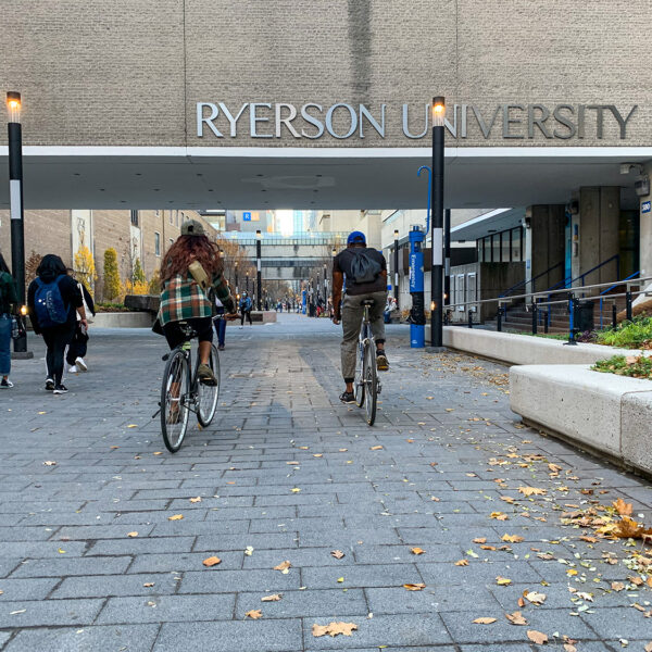 Students biking through campus.