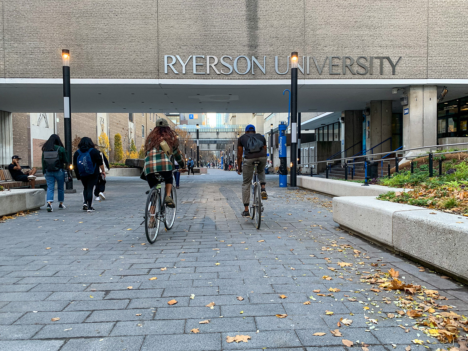 Students biking through campus.