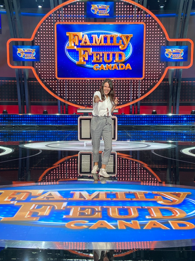 Linds Christopher on the set of TV show Family Feud Canada.