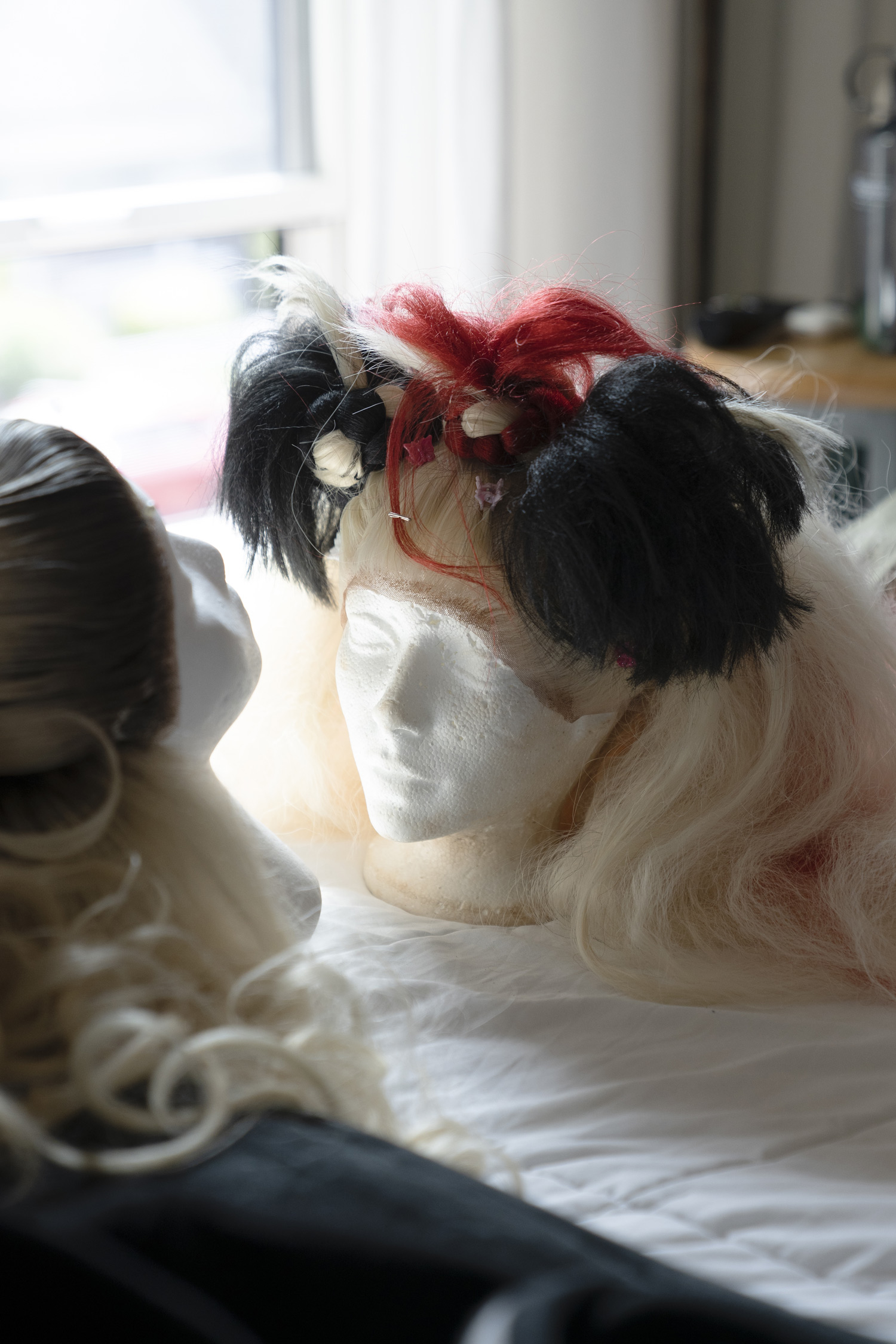 A wig on a mannequin.