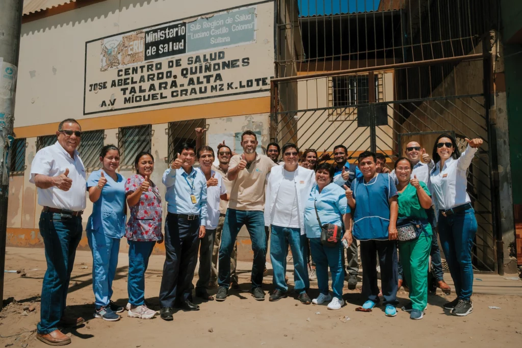 A large group of people pose for a photo.