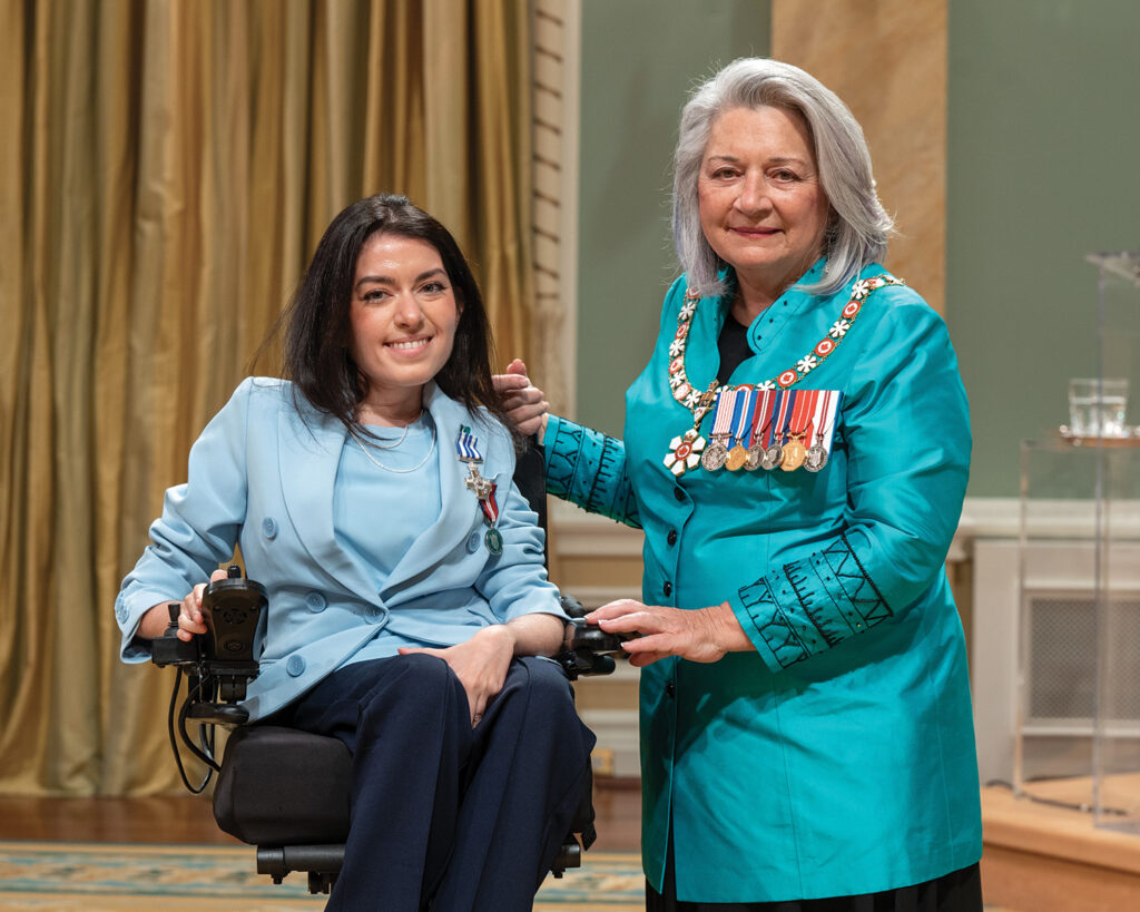 Maayan Ziv receives the Meritorious Service Cross from Governor General Mary Simon.