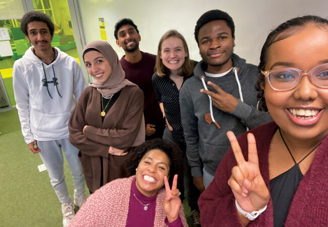 Young students from diverse background pose for a picture