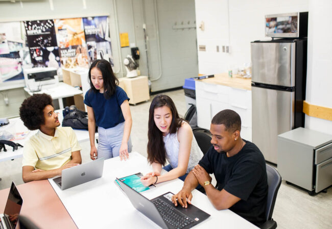 People working in an open office.