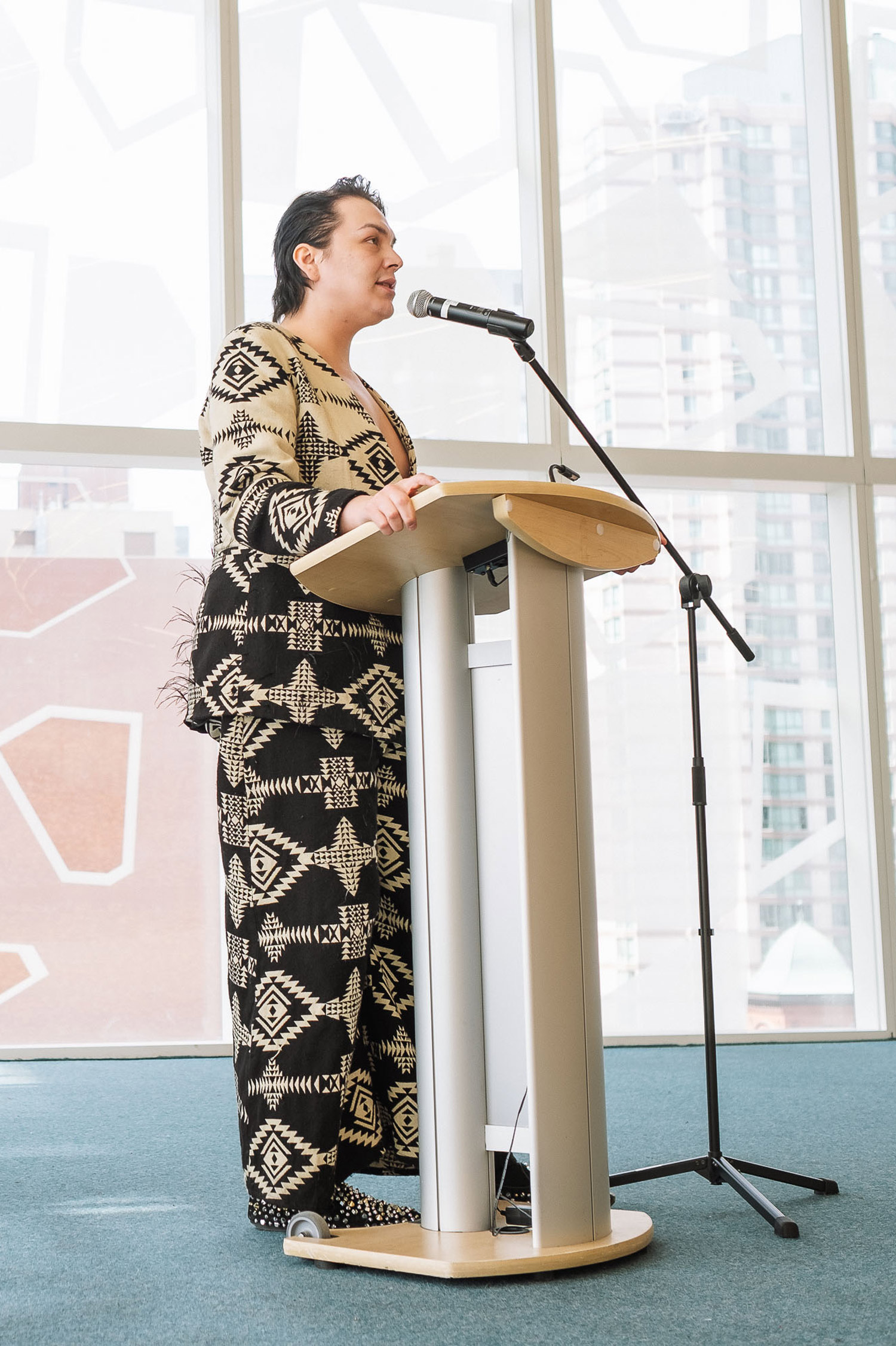 Chelazon LeRoux, Two-Spirit artist and Canada's Drag Race contestant, delivering the keynote address.