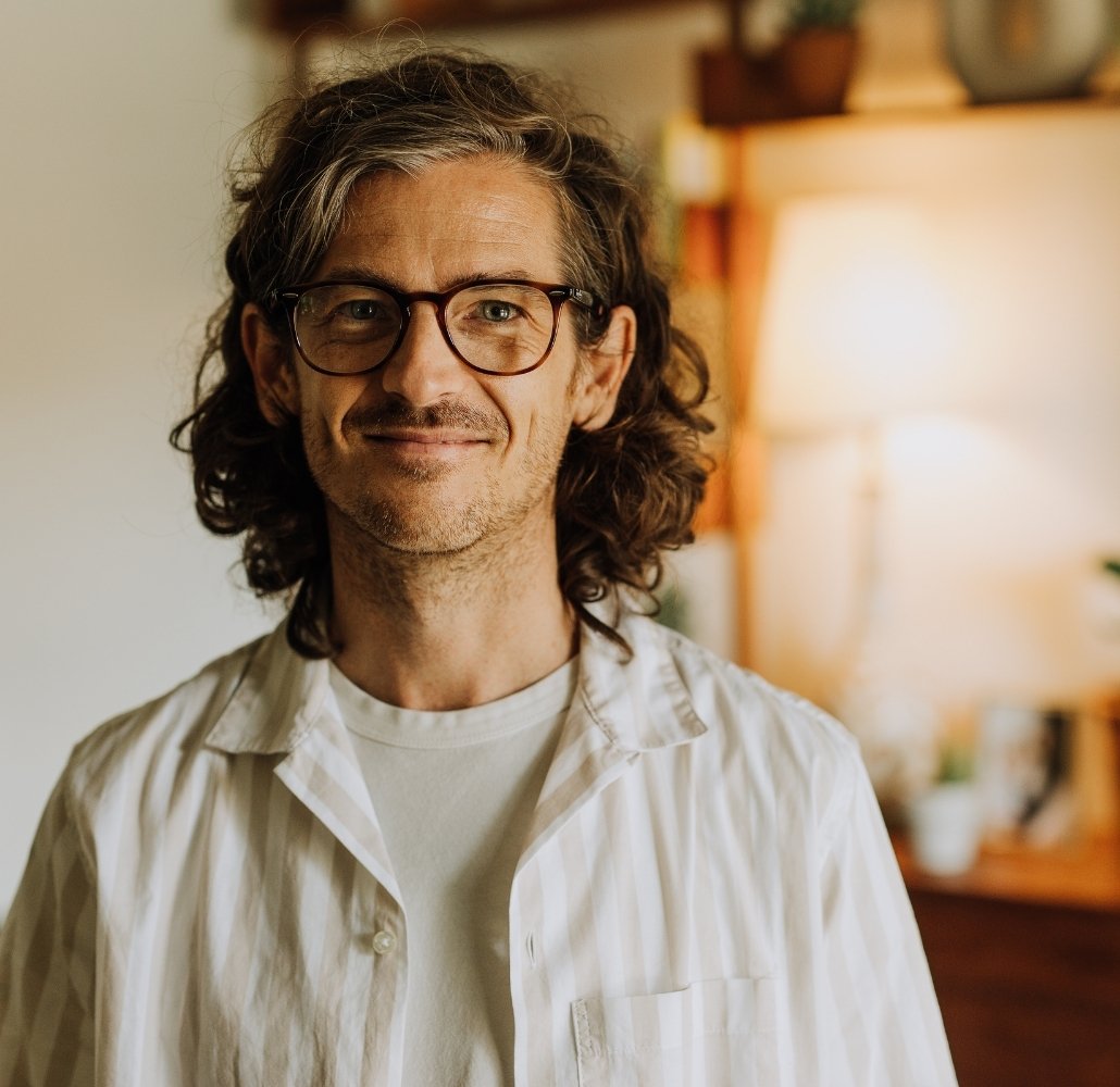 Alt text: James Cairns smiling.