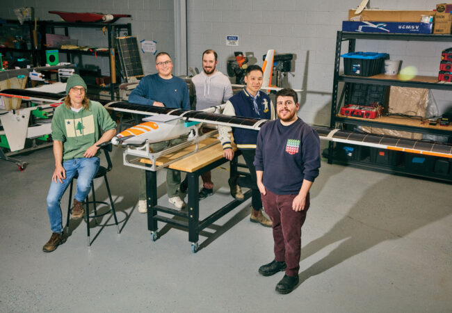 From left, Bill Bissonnette, Travis Krebs, MIchael Melville, Alton Yeung and Devin Barcelos standing with their drone.